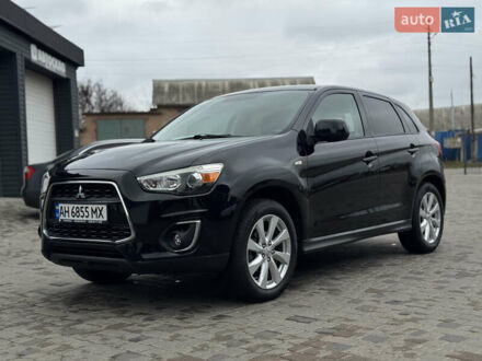 Черный Мицубиси Outlander Sport, объемом двигателя 2 л и пробегом 157 тыс. км за 11900 $, фото 1 на Automoto.ua