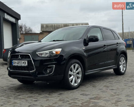 Черный Мицубиси Outlander Sport, объемом двигателя 2 л и пробегом 157 тыс. км за 11900 $, фото 1 на Automoto.ua