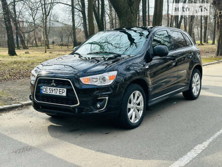 Чорний Міцубісі Outlander Sport, об'ємом двигуна 2 л та пробігом 144 тис. км за 12150 $, фото 1 на Automoto.ua