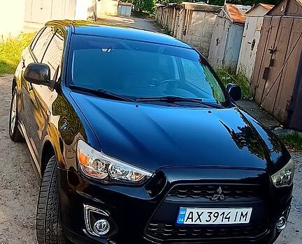 Черный Мицубиси Outlander Sport, объемом двигателя 2 л и пробегом 116 тыс. км за 13000 $, фото 1 на Automoto.ua