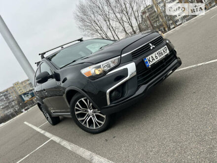 Черный Мицубиси Outlander Sport, объемом двигателя 2.4 л и пробегом 109 тыс. км за 11900 $, фото 1 на Automoto.ua