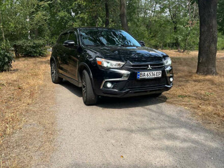 Черный Мицубиси Outlander Sport, объемом двигателя 2 л и пробегом 140 тыс. км за 12350 $, фото 1 на Automoto.ua