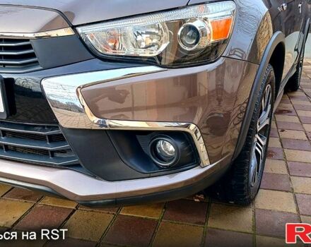 Коричневый Мицубиси Outlander Sport, объемом двигателя 2 л и пробегом 80 тыс. км за 14700 $, фото 6 на Automoto.ua