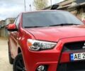 Червоний Міцубісі Outlander Sport, об'ємом двигуна 2 л та пробігом 250 тис. км за 10500 $, фото 1 на Automoto.ua