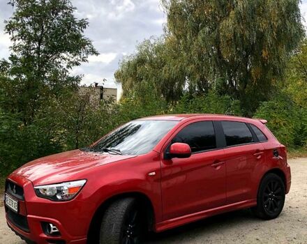 Красный Мицубиси Outlander Sport, объемом двигателя 2 л и пробегом 250 тыс. км за 10500 $, фото 3 на Automoto.ua