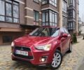 Красный Мицубиси Outlander Sport, объемом двигателя 2 л и пробегом 203 тыс. км за 9250 $, фото 1 на Automoto.ua