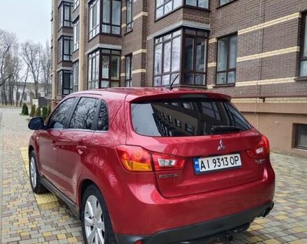Красный Мицубиси Outlander Sport, объемом двигателя 2 л и пробегом 203 тыс. км за 9250 $, фото 7 на Automoto.ua