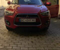 Красный Мицубиси Outlander Sport, объемом двигателя 2 л и пробегом 128 тыс. км за 12800 $, фото 11 на Automoto.ua