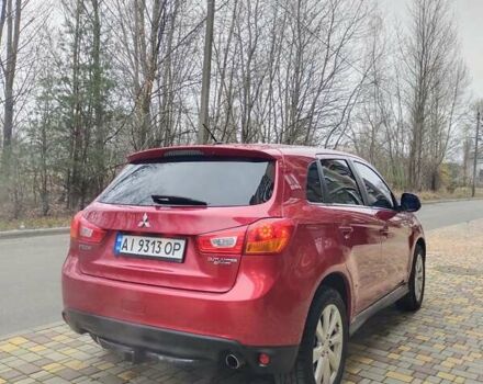 Красный Мицубиси Outlander Sport, объемом двигателя 2 л и пробегом 203 тыс. км за 9250 $, фото 5 на Automoto.ua