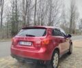 Красный Мицубиси Outlander Sport, объемом двигателя 2 л и пробегом 203 тыс. км за 9250 $, фото 5 на Automoto.ua