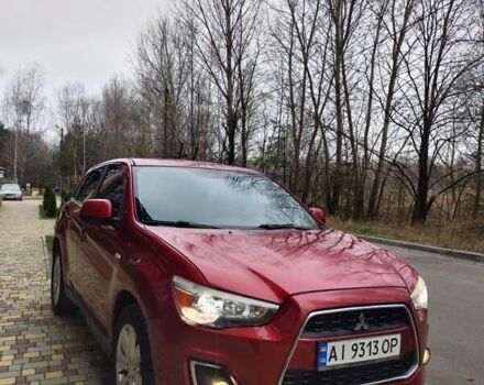 Красный Мицубиси Outlander Sport, объемом двигателя 2 л и пробегом 203 тыс. км за 9250 $, фото 2 на Automoto.ua