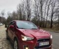 Красный Мицубиси Outlander Sport, объемом двигателя 2 л и пробегом 203 тыс. км за 9250 $, фото 2 на Automoto.ua