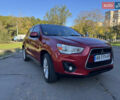 Міцубісі Outlander Sport 2013 у Одесі на Automoto.ua Червоний Міцубісі Outlander Sport, об'ємом двигуна 2 л та пробігом 104 тис. км за 10600 $, фото 8 на Automoto.ua