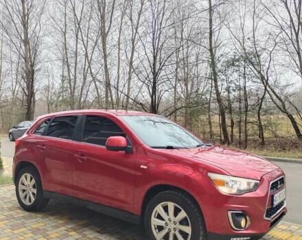 Красный Мицубиси Outlander Sport, объемом двигателя 2 л и пробегом 203 тыс. км за 9250 $, фото 3 на Automoto.ua