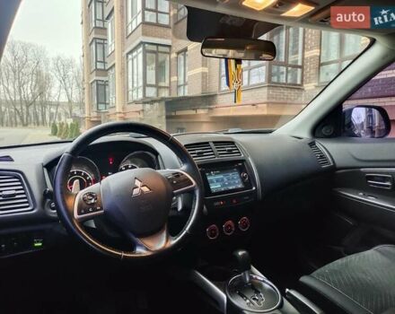 Красный Мицубиси Outlander Sport, объемом двигателя 2 л и пробегом 203 тыс. км за 9250 $, фото 10 на Automoto.ua