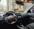 Красный Мицубиси Outlander Sport, объемом двигателя 2 л и пробегом 203 тыс. км за 9250 $, фото 10 на Automoto.ua