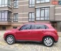Красный Мицубиси Outlander Sport, объемом двигателя 2 л и пробегом 203 тыс. км за 9250 $, фото 8 на Automoto.ua