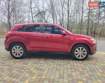 Красный Мицубиси Outlander Sport, объемом двигателя 2 л и пробегом 203 тыс. км за 9250 $, фото 4 на Automoto.ua