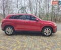 Красный Мицубиси Outlander Sport, объемом двигателя 2 л и пробегом 203 тыс. км за 9250 $, фото 4 на Automoto.ua