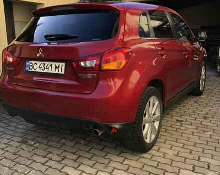 Красный Мицубиси Outlander Sport, объемом двигателя 2 л и пробегом 128 тыс. км за 12800 $, фото 3 на Automoto.ua