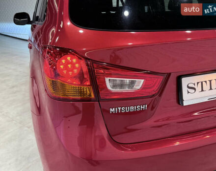 Красный Мицубиси Outlander Sport, объемом двигателя 2 л и пробегом 99 тыс. км за 11999 $, фото 51 на Automoto.ua