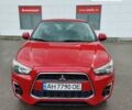 Красный Мицубиси Outlander Sport, объемом двигателя 2 л и пробегом 170 тыс. км за 10500 $, фото 8 на Automoto.ua