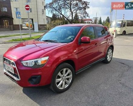 Красный Мицубиси Outlander Sport, объемом двигателя 2 л и пробегом 220 тыс. км за 11500 $, фото 3 на Automoto.ua