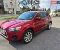 Красный Мицубиси Outlander Sport, объемом двигателя 2 л и пробегом 220 тыс. км за 11500 $, фото 3 на Automoto.ua