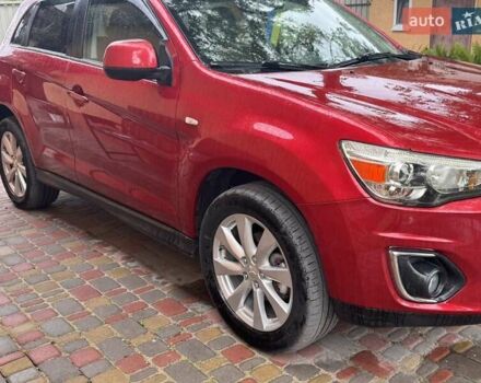 Красный Мицубиси Outlander Sport, объемом двигателя 2 л и пробегом 172 тыс. км за 12500 $, фото 2 на Automoto.ua