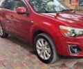 Красный Мицубиси Outlander Sport, объемом двигателя 2 л и пробегом 172 тыс. км за 12500 $, фото 2 на Automoto.ua