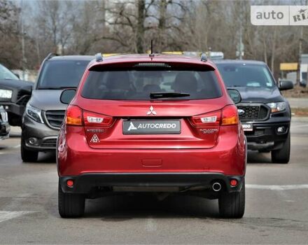 Красный Мицубиси Outlander Sport, объемом двигателя 2 л и пробегом 195 тыс. км за 12800 $, фото 5 на Automoto.ua