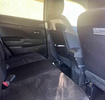 Красный Мицубиси Outlander Sport, объемом двигателя 2 л и пробегом 172 тыс. км за 12500 $, фото 8 на Automoto.ua