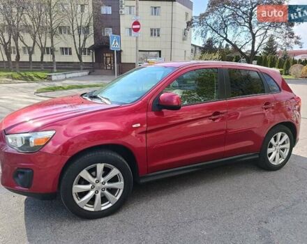 Красный Мицубиси Outlander Sport, объемом двигателя 2 л и пробегом 220 тыс. км за 11500 $, фото 2 на Automoto.ua