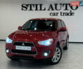 Красный Мицубиси Outlander Sport, объемом двигателя 2 л и пробегом 99 тыс. км за 11999 $, фото 1 на Automoto.ua