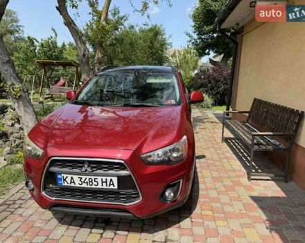 Красный Мицубиси Outlander Sport, объемом двигателя 2 л и пробегом 172 тыс. км за 12500 $, фото 4 на Automoto.ua