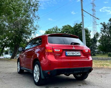Красный Мицубиси Outlander Sport, объемом двигателя 2 л и пробегом 174 тыс. км за 10700 $, фото 2 на Automoto.ua