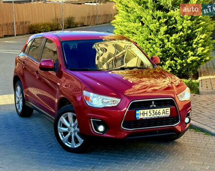 Красный Мицубиси Outlander Sport, объемом двигателя 2 л и пробегом 99 тыс. км за 11999 $, фото 3 на Automoto.ua