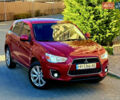 Красный Мицубиси Outlander Sport, объемом двигателя 2 л и пробегом 99 тыс. км за 11999 $, фото 3 на Automoto.ua