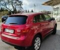 Красный Мицубиси Outlander Sport, объемом двигателя 2 л и пробегом 220 тыс. км за 11500 $, фото 8 на Automoto.ua