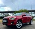 Красный Мицубиси Outlander Sport, объемом двигателя 2 л и пробегом 174 тыс. км за 10700 $, фото 5 на Automoto.ua