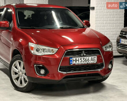 Красный Мицубиси Outlander Sport, объемом двигателя 2 л и пробегом 99 тыс. км за 11999 $, фото 1 на Automoto.ua