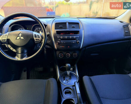 Красный Мицубиси Outlander Sport, объемом двигателя 2 л и пробегом 99 тыс. км за 11999 $, фото 36 на Automoto.ua