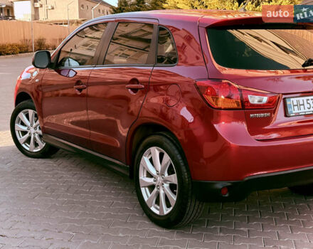 Красный Мицубиси Outlander Sport, объемом двигателя 2 л и пробегом 99 тыс. км за 11999 $, фото 55 на Automoto.ua