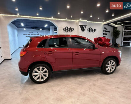 Красный Мицубиси Outlander Sport, объемом двигателя 2 л и пробегом 99 тыс. км за 11999 $, фото 4 на Automoto.ua