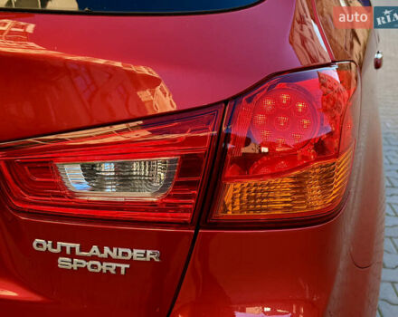 Красный Мицубиси Outlander Sport, объемом двигателя 2 л и пробегом 99 тыс. км за 11999 $, фото 28 на Automoto.ua