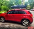 Красный Мицубиси Outlander Sport, объемом двигателя 2 л и пробегом 220 тыс. км за 11300 $, фото 4 на Automoto.ua
