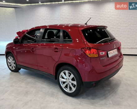 Красный Мицубиси Outlander Sport, объемом двигателя 2 л и пробегом 99 тыс. км за 11999 $, фото 3 на Automoto.ua