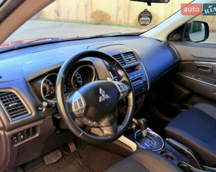 Красный Мицубиси Outlander Sport, объемом двигателя 2 л и пробегом 99 тыс. км за 11999 $, фото 38 на Automoto.ua