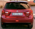 Красный Мицубиси Outlander Sport, объемом двигателя 2 л и пробегом 99 тыс. км за 11999 $, фото 5 на Automoto.ua