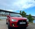 Красный Мицубиси Outlander Sport, объемом двигателя 2 л и пробегом 174 тыс. км за 10700 $, фото 1 на Automoto.ua